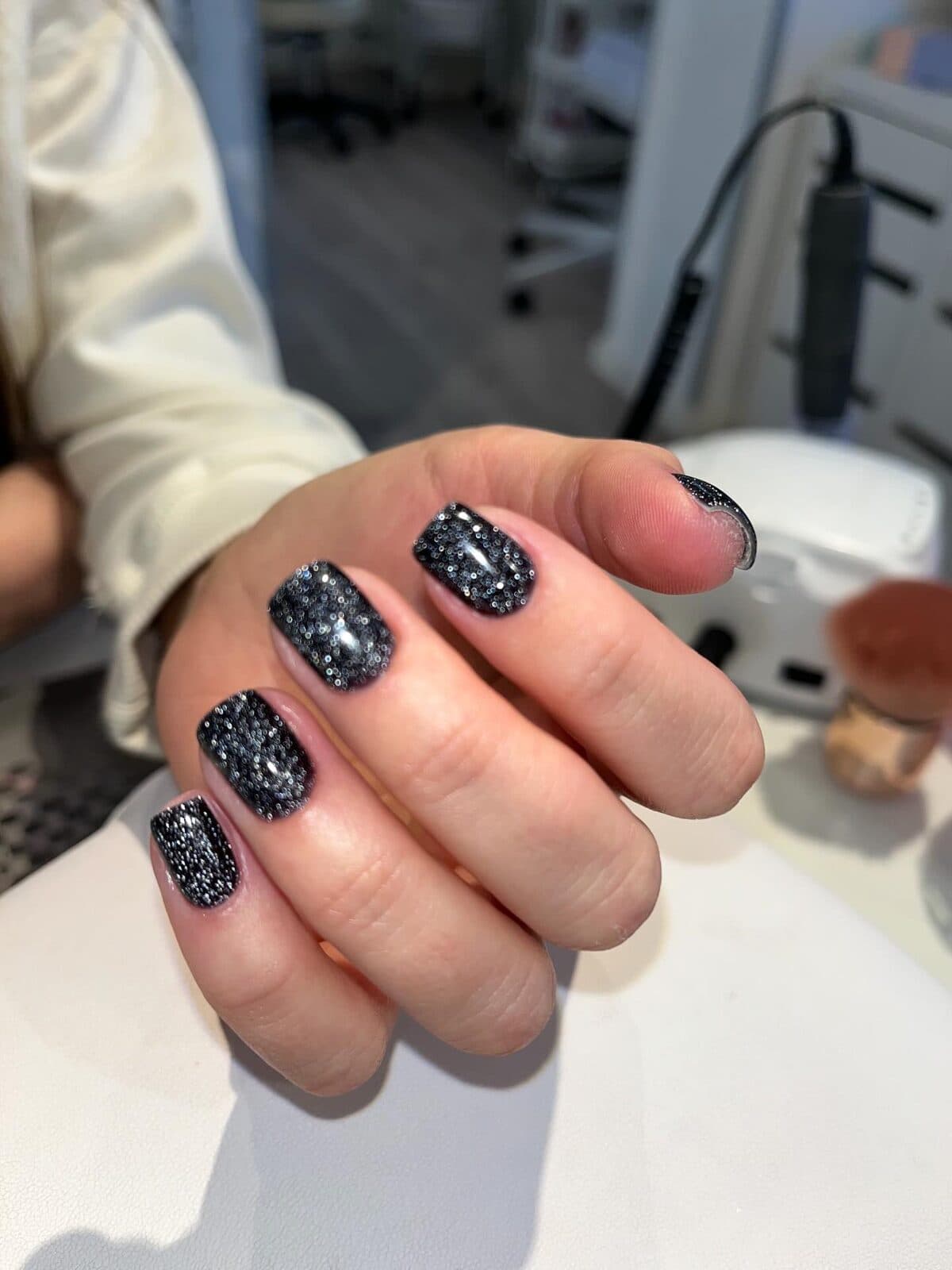 Sorte glimmer negle